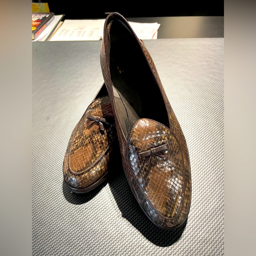 Stuart Weitzman lizard loafers.